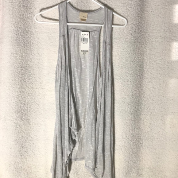 Daytrip Sweaters - Sleeveless cardigan